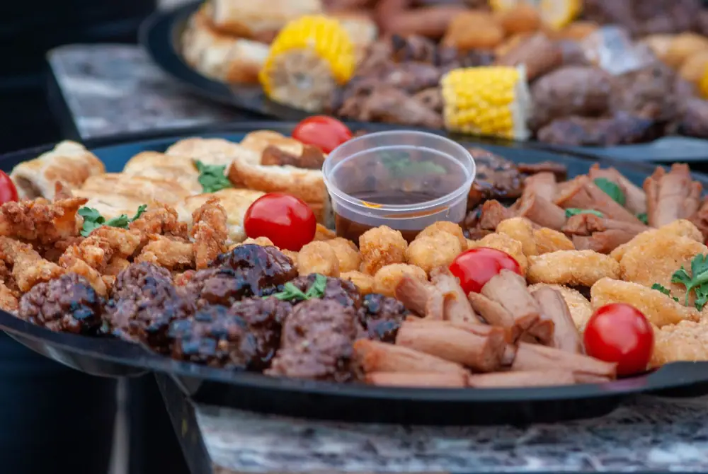 A large platter of party finger food and small bites on a table